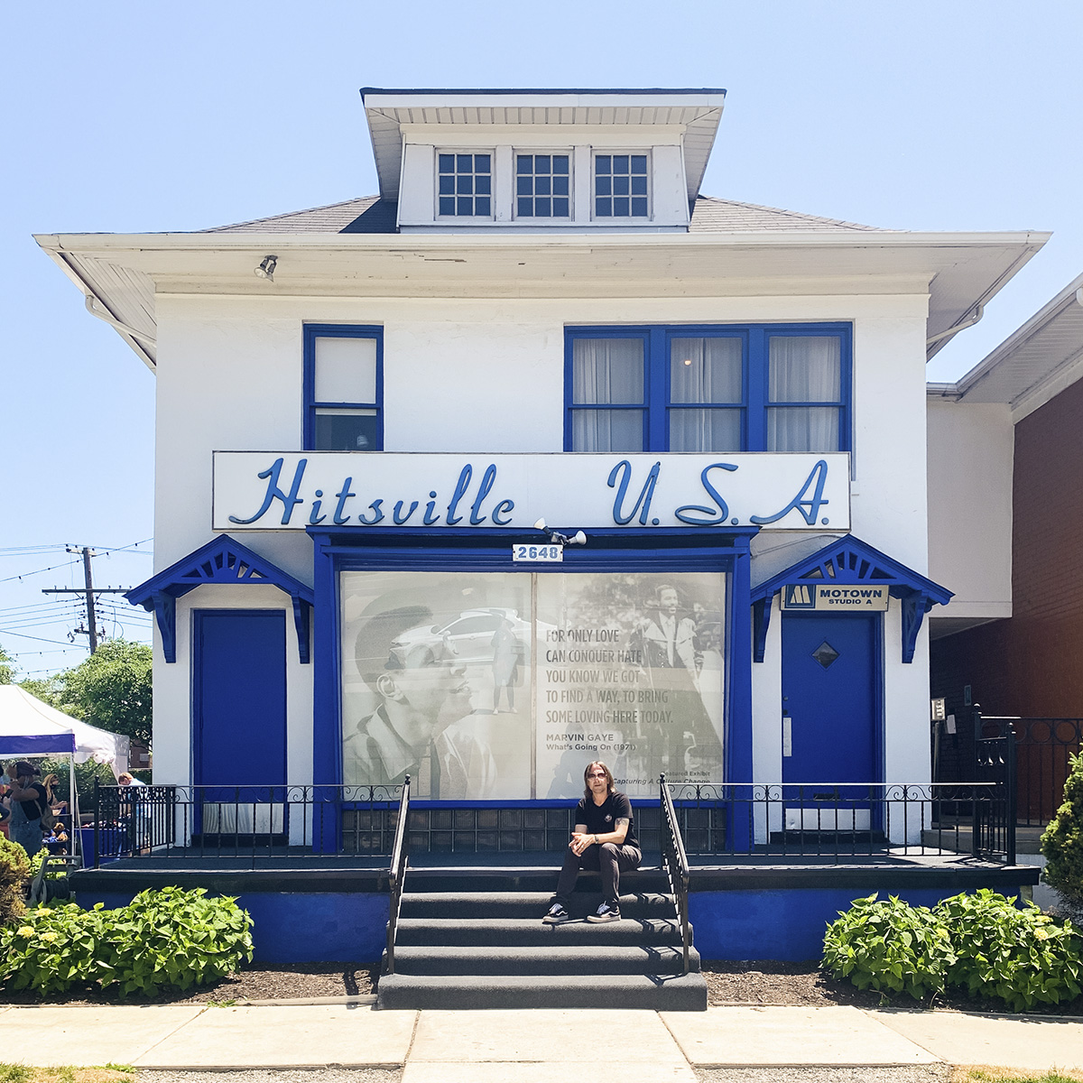 Stephen sits on the steps of Motown